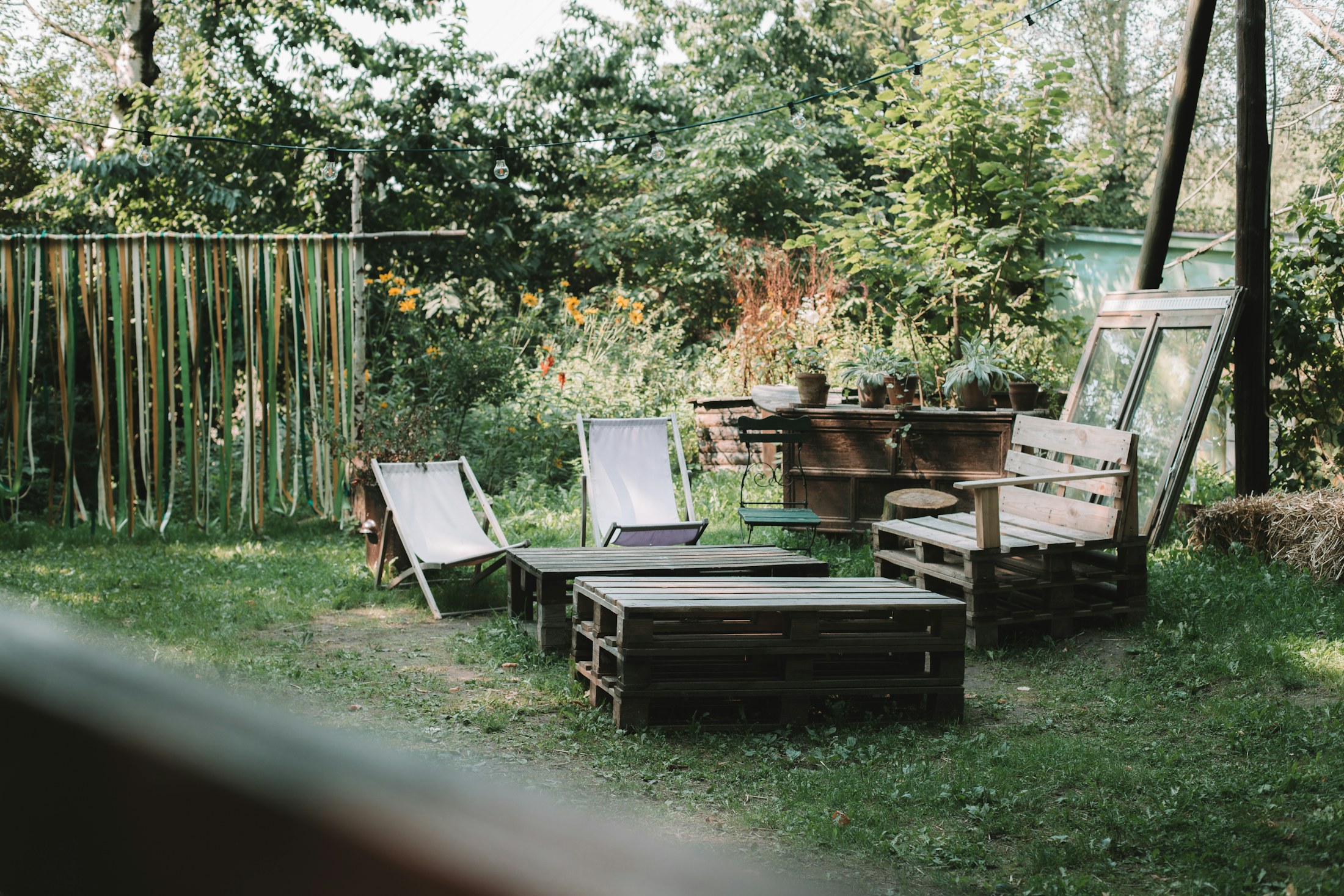 Outdoor timber seating with a relaxed pallet furniture feel